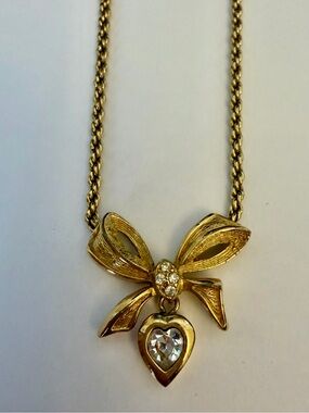 Authentic Christian Dior Gold Bow Pendant Necklace with Heart Crystal